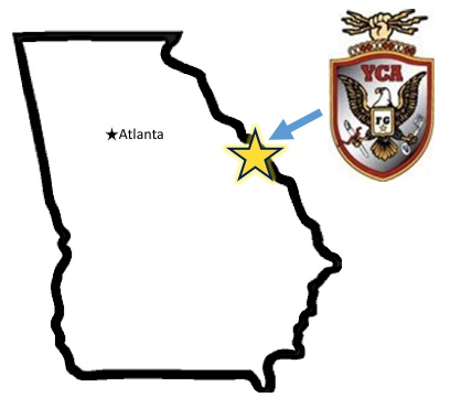 A map of Georgia with a star at the position of ft. gordon and the gordon logo.